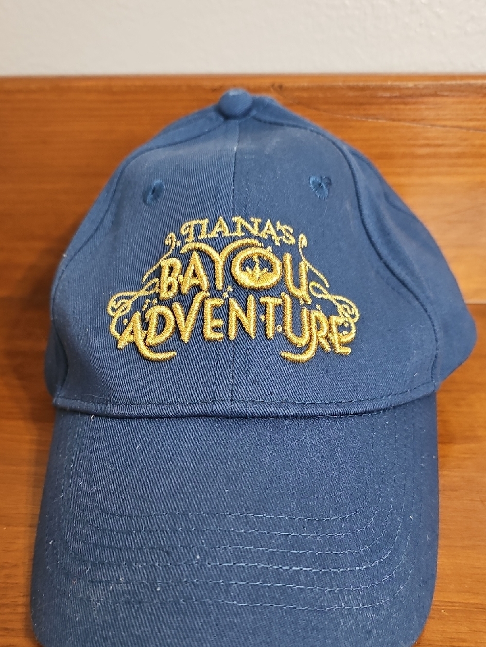 Disney Tianas Bayou Adventure Embroidered Navy Baseball Cap - Yellow Logo
